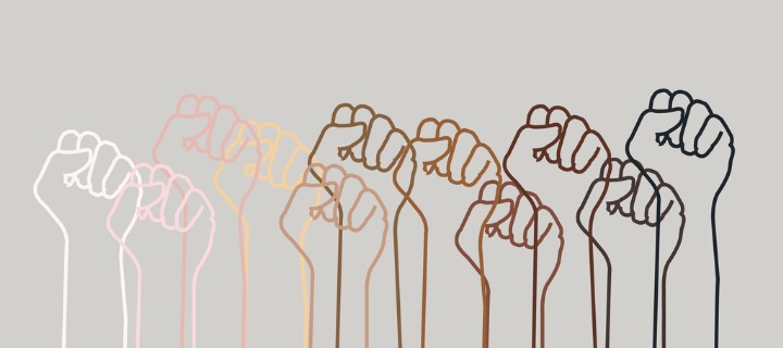 A line drawing of white, pink, yellow, brown, and black fists, clenched and raised on a gray background.